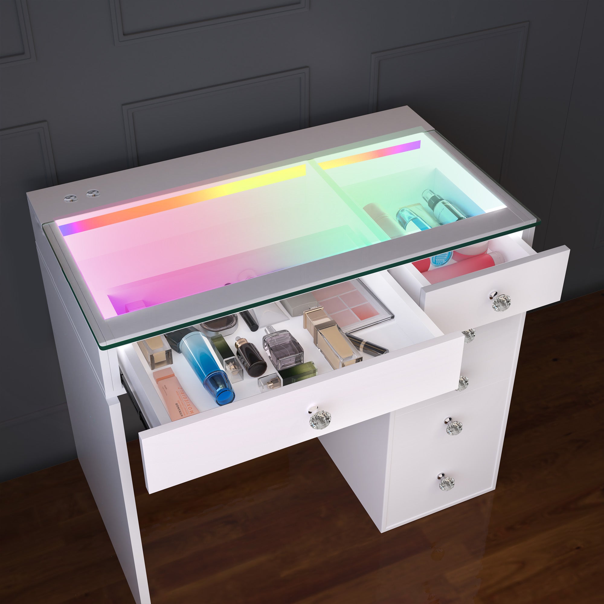 White makeup vanity with colorful LED light on top, displaying various cosmetic items.