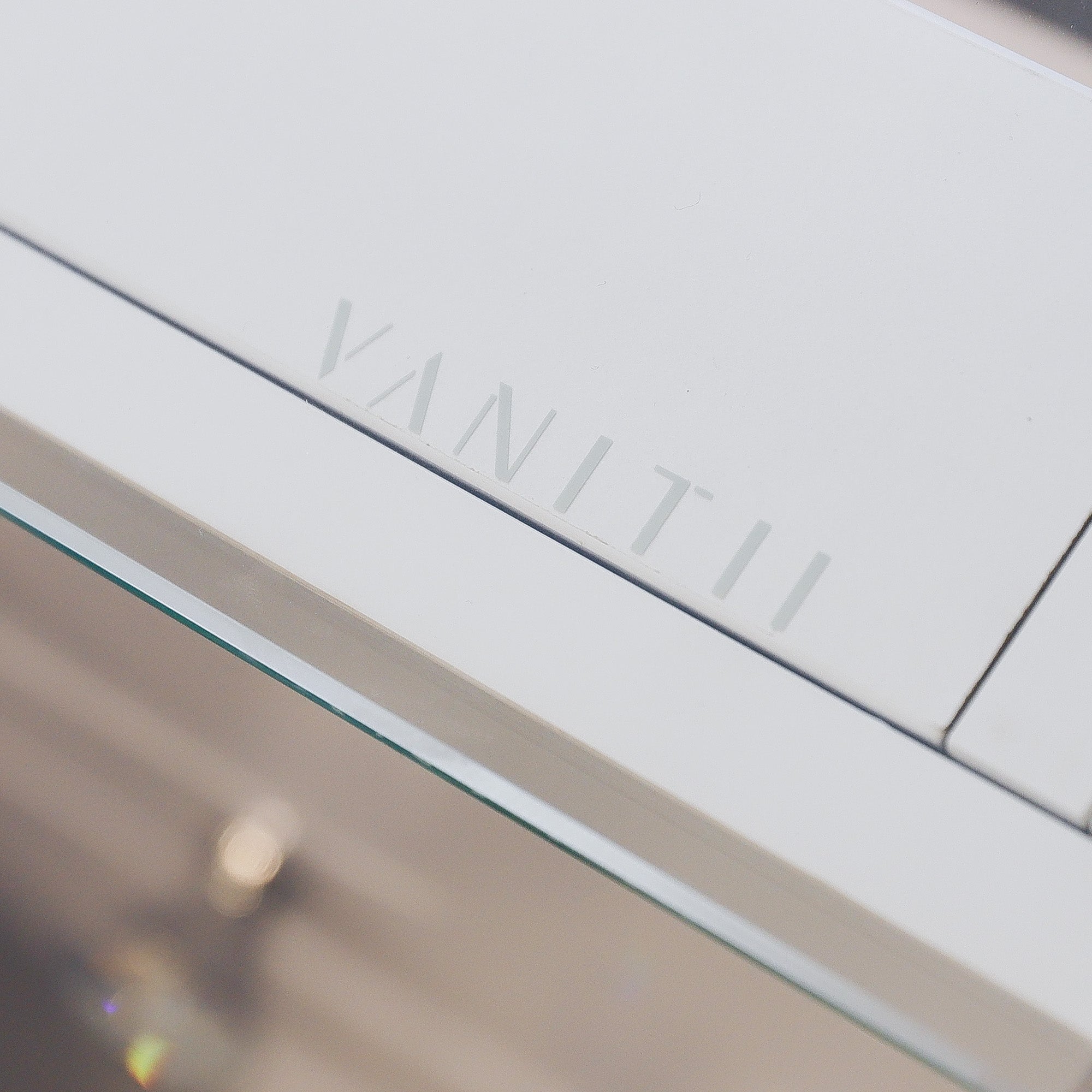 the logo of the table "VANITII"