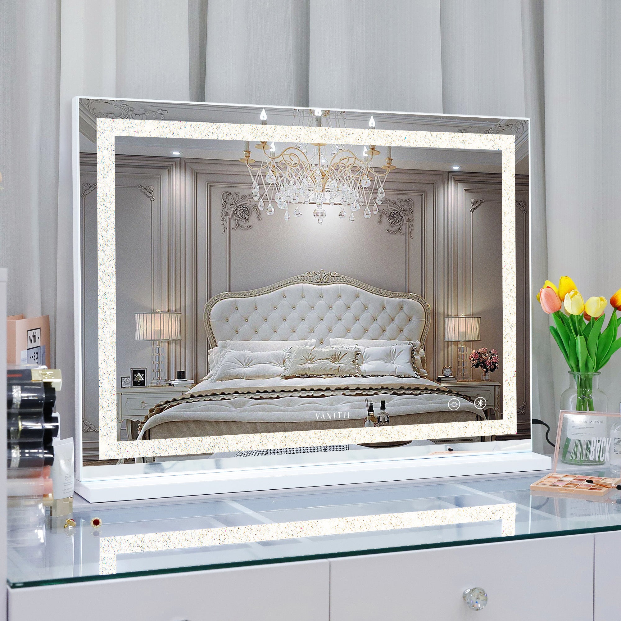 VANITII Crystal Hollywood Vanity Mirror features adjustable light strip,smart touch sensor,detachable mirror base and bluetooth speakers.The overall design is simple and white in color.Placed in the bedroom, it combines fashion and practicality perfectly.